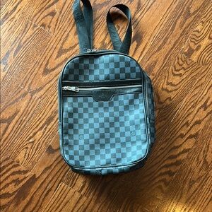 Gray and Black Checkered Backpack with Adjustable Straps